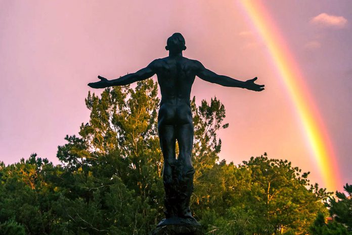 University of the Philippines Baguio Statue With Rainbow